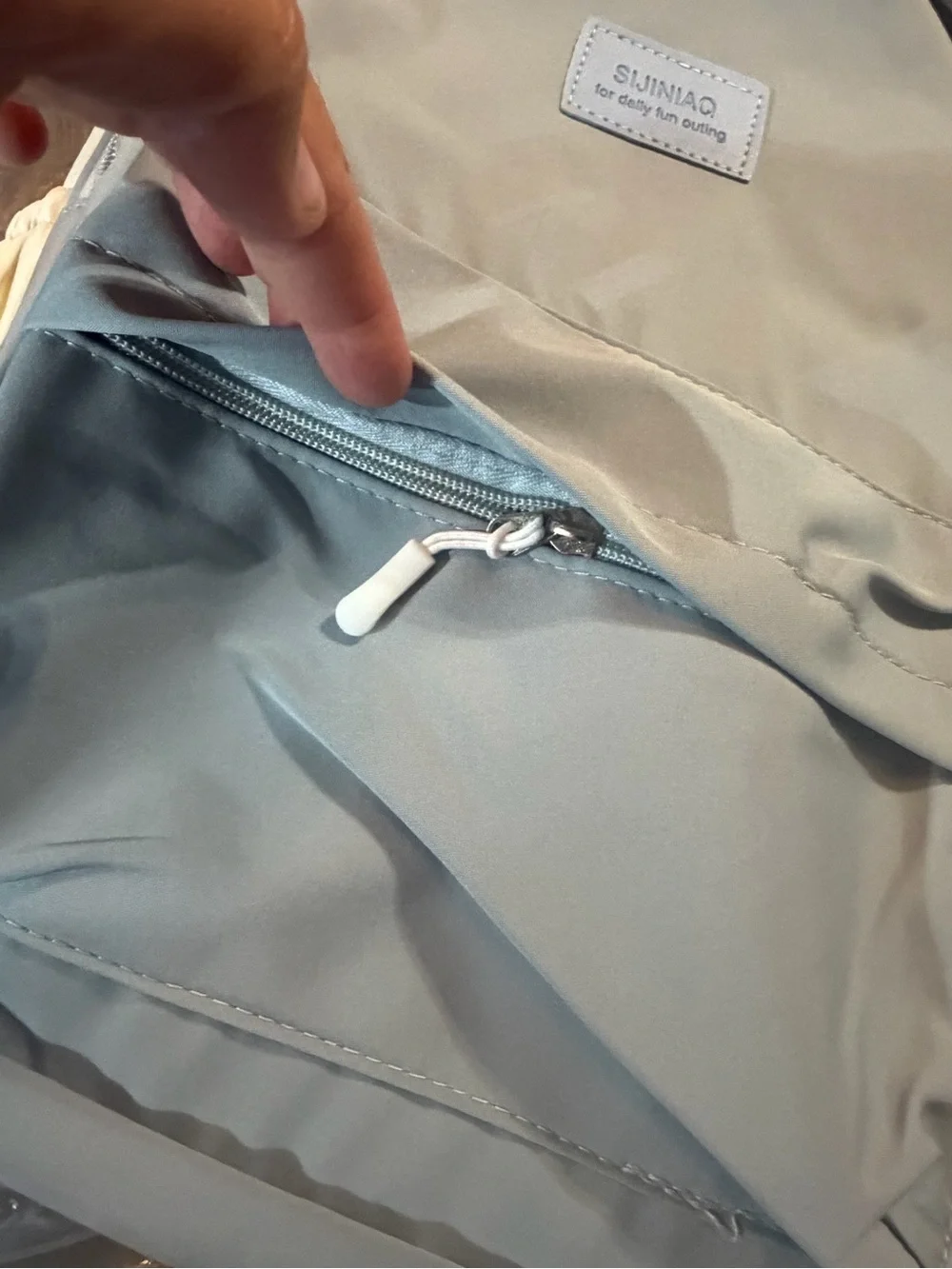 Light Gray Canvas Backpack with Cream Sides